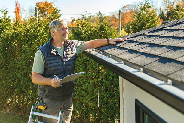 Professional Roof Inspection technician working in Interlochen, MI